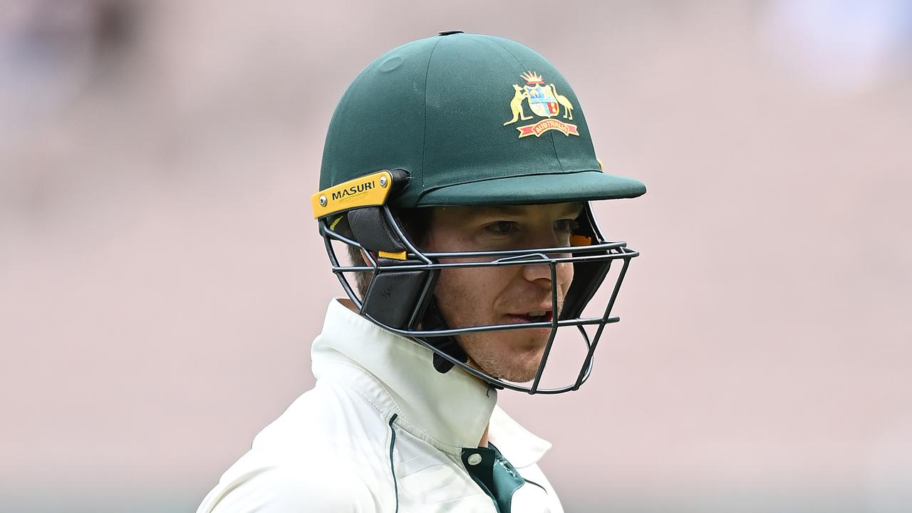 Tim Paine of Australia walks off the field after being dismissed by Ravindra Jadeja.