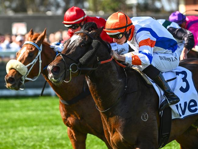 MELBOURNE, AUSTRALIA - SEPTEMBER 02: Damian Lane riding Veight defeats Jamie Kah riding Lagacies in Race 5, the Ive Mcneil Stakes,   during Melbourne Racing at Caulfield Racecourse on September 02, 2023 in Melbourne, Australia. (Photo by Vince Caligiuri/Getty Images)