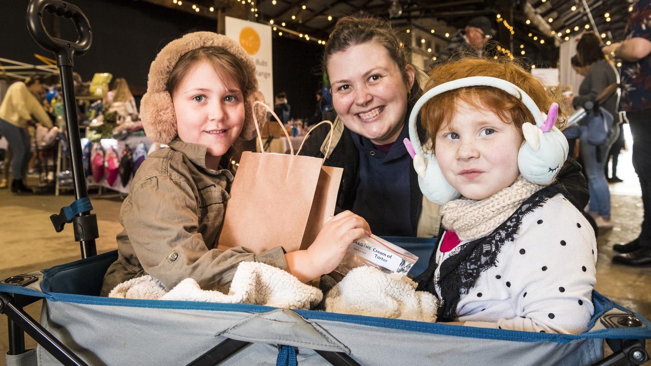 TRAVELLING IN STYLE: Getting a ride around the Mums and Bubs Expo are Theiadore (left) and Eleanorah Larkins with mum Isabelle Larkins at the Mills Precinct. Pictures: Kevin Farmer