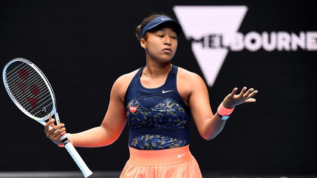 A moment of confusion as Japan’s Naomi Osaka attempts to challenge the electronic line-calling system. Picture: AFP