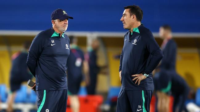 Graham Arnold and assistant coach Tony Vidmar at Socceroos training.