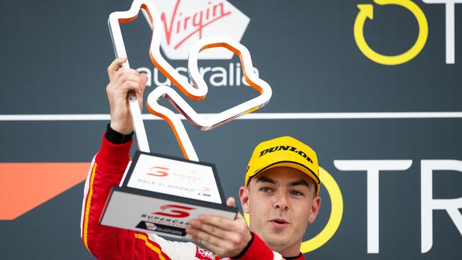 Scott McLaughlin holds his winner’s trophy aloft at the OTR SuperSprint at The Bend. Picture: Daniel Kalisz/Getty Images