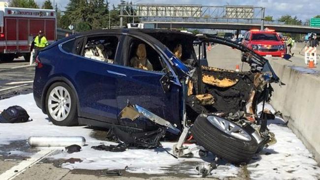 An Apple engineer who died when his Tesla Model X crashed into a concrete barrier complained before his death that the car’s autopilot system would malfunction in the area where the crash happened. Picture: KTVU-TV / AP