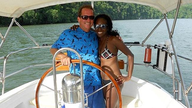 Shot dead: Gregory Faull on board his boat in Belize. Picture: Facebook