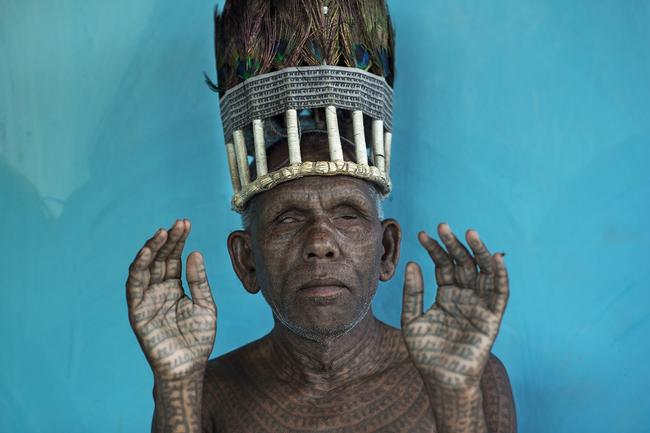 2014 National Geographic Photography Contest ... Honorable Mention People Photo: “Biltigiri”. The chef of the Ramnami people in Chhattisgarh, India. Ramnami tattoo the name of the lord “Ram” on their body. Their entire focus is on the name of Ram, the name of God that is most dear to them. The Ramnami Samaj is a sect of harijan (untouchable) Ram. Formed in the 1890s, the sect has become a dominant force in the religious life of the area. The tattoo is the result of their devotion and also, a gift and an acknowledgement from Ram Location: India, Chhattisgarh. Picture: Mattia passarini /National Geographic 2014 Photo Contest