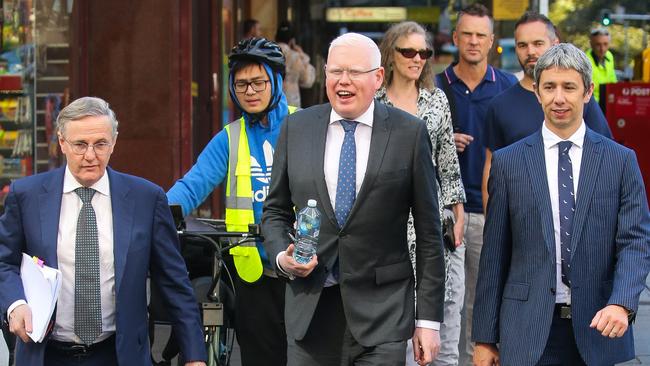 Kiama MP Gareth Ward (centre) outside Downing Court with his barrister David Campbell SC (left) and instructing solicitor Robert Forster. Picture: Gaye Gerard