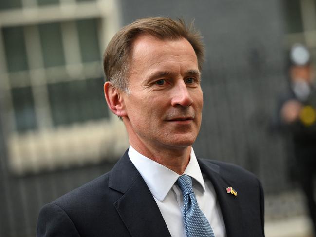 Britain's re-appointed Chancellor of the Exchequer Jeremy Hunt leaves after a meeting with Britain's newly appointed Prime Minister Rishi Sunak at 10 Downing Street. Picture: AFP