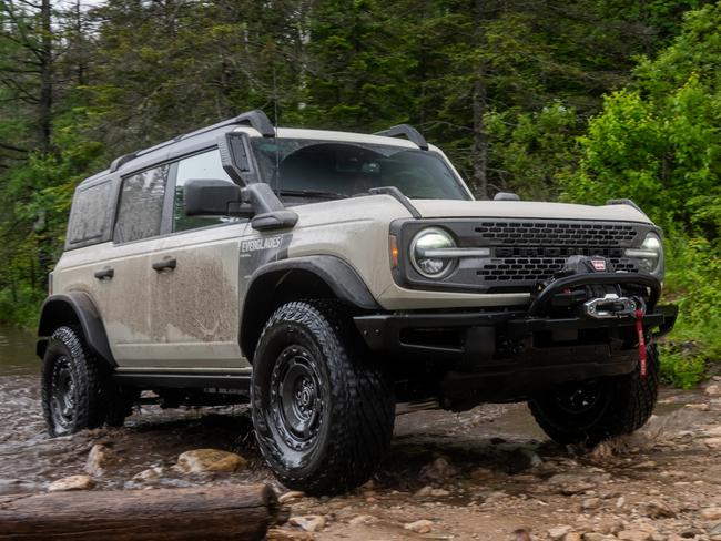 EMBARGO FOR TWAM 10 JUNE 2023. FEE MAY APPLY. Ford Bronco Everglades in Desert Sand. Available summer 2022. Limited availability. Desert Sand is optional. Ford Accessories shown. Professional driver on a closed course. Always consult the OwnerÃ¢â¬â¢s Manual before off-road driving, know your terrain and trail difficulty, and use appropriate safety gear. Always determine the water depth before attempting a crossing and proceed slowly. Refer to your ownerÃ¢â¬â¢s manual for detailed information regarding driving through water. Ford is committed to the preservation of the environment and treading lightly. Bronco Everglades features special Ford installed accessories to help increase its water fording capabilities.