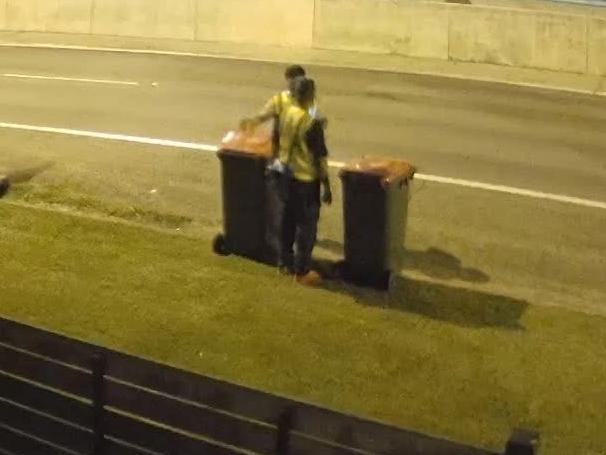 Townsville City Coucil workers checking recycling bins down Riverway Dr at 8pm as part of its bin health check program. Picture: Facebook/Cory Brooks