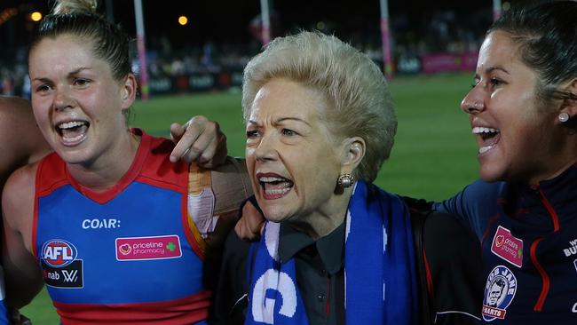 Susan Alberti sings the club song with Katie Brennan and Aasta Connor after the round 1 win. Picture: Wayne Ludbeyy