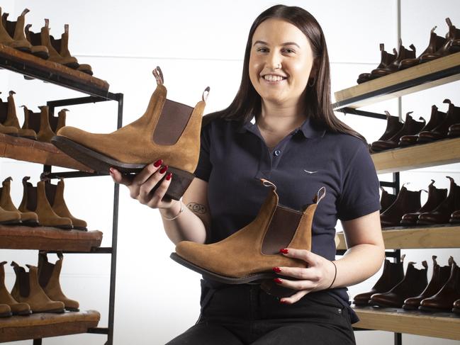 RM Williams - Womens Boot launch at RMW factory in Salisbury - Staff member Chloe Fabian tries on a pair of the new womenÃ¢â‚¬â„¢s boots. 18th April 2024 Picture: Brett HartwigChloe 0475411237Phil Fabian 0417039461