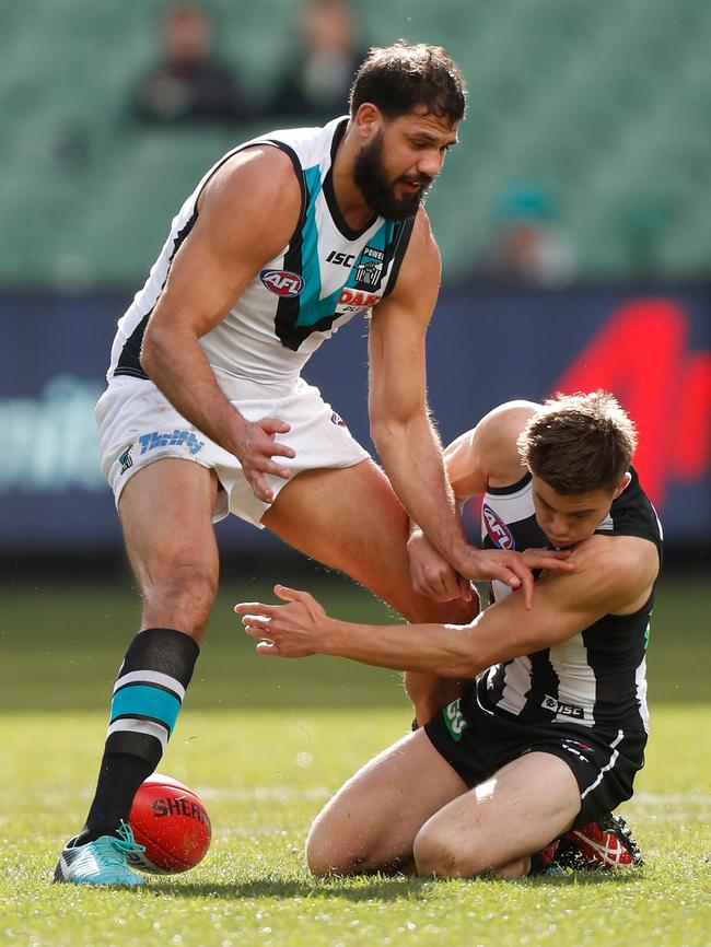 Paddy Ryder battles with Josh Thomas over a loose ball. Picture: Michael Willson/AFL Media/Getty Images