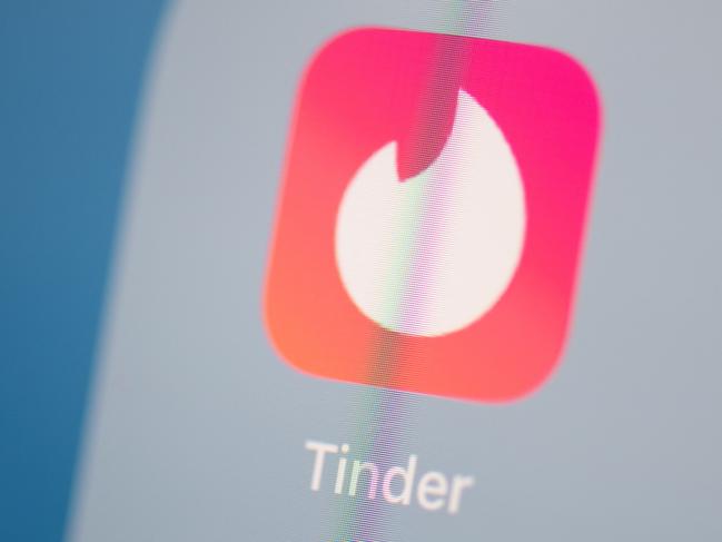 (FILES) This illustration picture taken on July 24, 2019 in Paris shows the logo of the US social networking application Tinder on the screen of a tablet. The trial of a man accused of raping and sexually assaulting numerous women using the dating application Tinder runs in Paris to March 29, 2024. (Photo by Martin BUREAU / AFP)