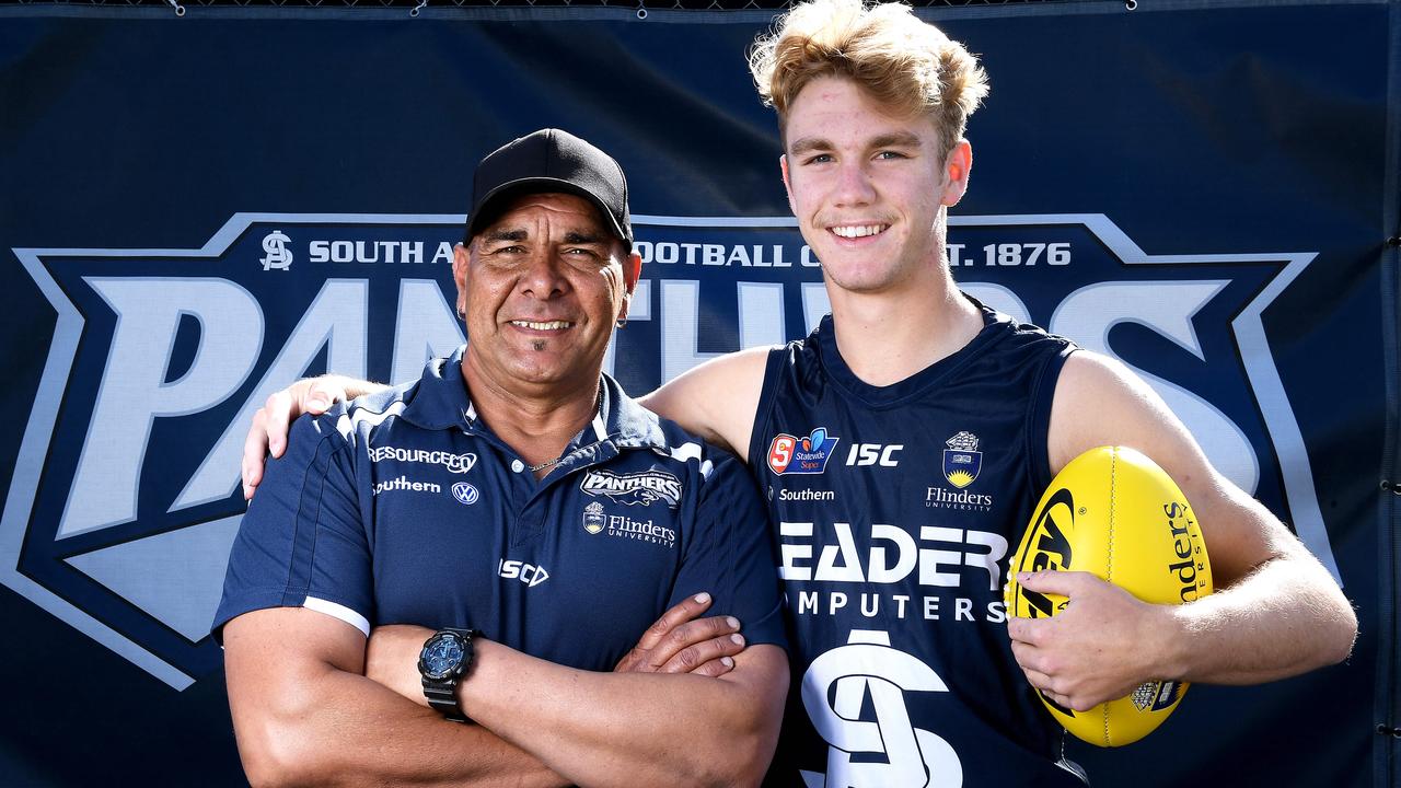 Ex-Port Adelaide player Fabian Francis with his son, Jason. Picture: Mark Brake