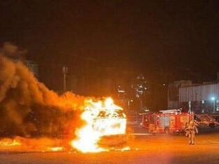 One of the buses on fire after a bomb exploded. Picture: Israeli TV.