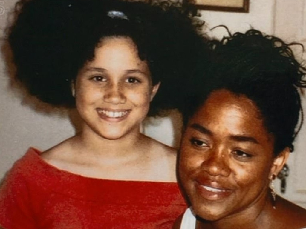 A young Meghan Markle and her mother, Doria Ragland.