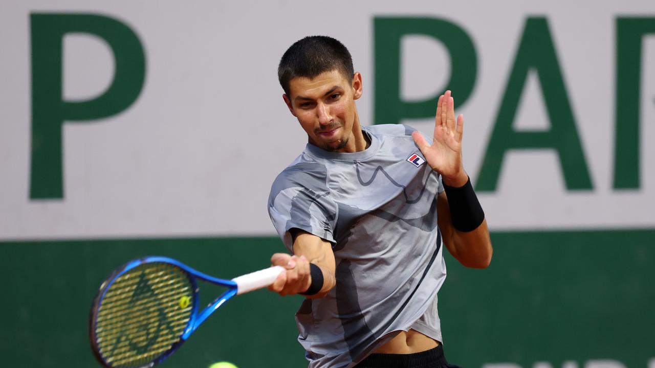 PARIS, FRANCE – MAY 28: Alexei Popyrin of Australia plays a forehand against Thanasi Kokkinakis of Australia in the Men's Singles first round match on Day Three of the 2024 French Open at Roland Garros on May 28, 2024 in Paris, France. (Photo by Dan Istitene/Getty Images)