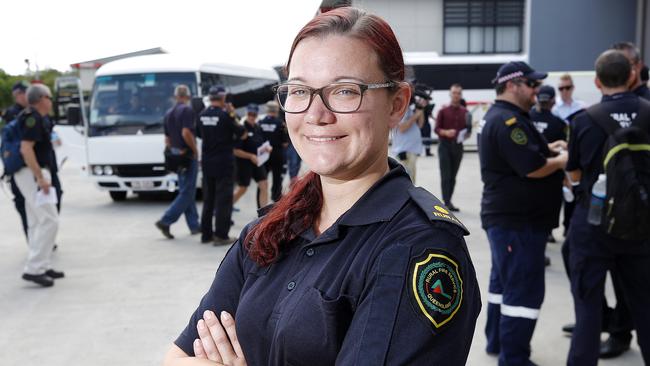 Mother of three Christy Lewis from the Queensland Rural Fire Brigade has been deployed to fight bushfires in New South Wales. Picture: AAP/Josh Woning