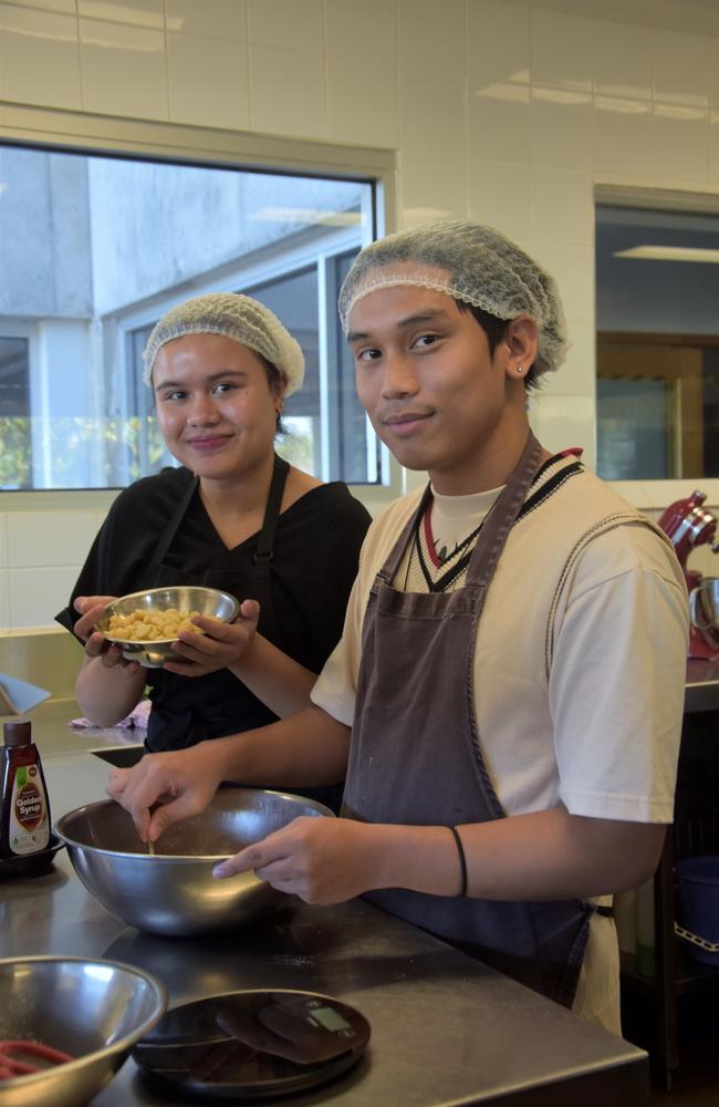 Darwin High School Year 12 integrated learning students Siri Nichols and Delson Palomaria Picture: Sierra Haigh