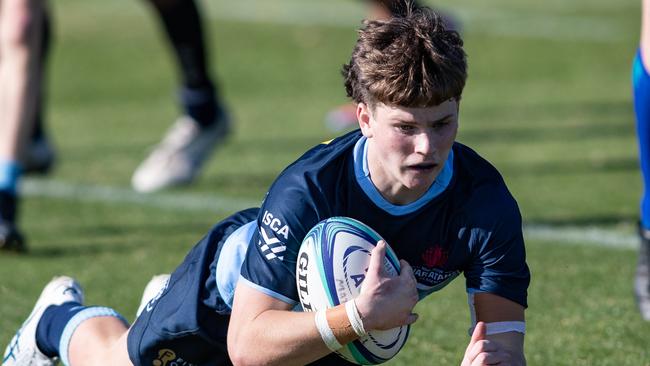 Joey Fowler scores for the Academy side.