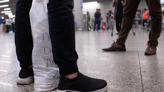 A man deported from US arrives at Confins International Airport in Confins, Minas Gerais state, Brazil on January 25, 2025. (Photo by Douglas MAGNO / AFP)