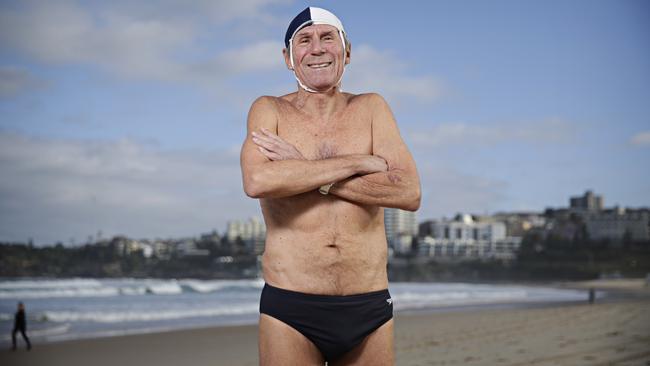 Channel swimmer Cyril Baldock, at his beloved Bondi Beach, has been honoured for services to lifesaving in the Queen’s birthday honours. Picture: Adam Yip