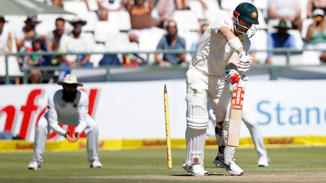 David Warner’s off stump goes flying.