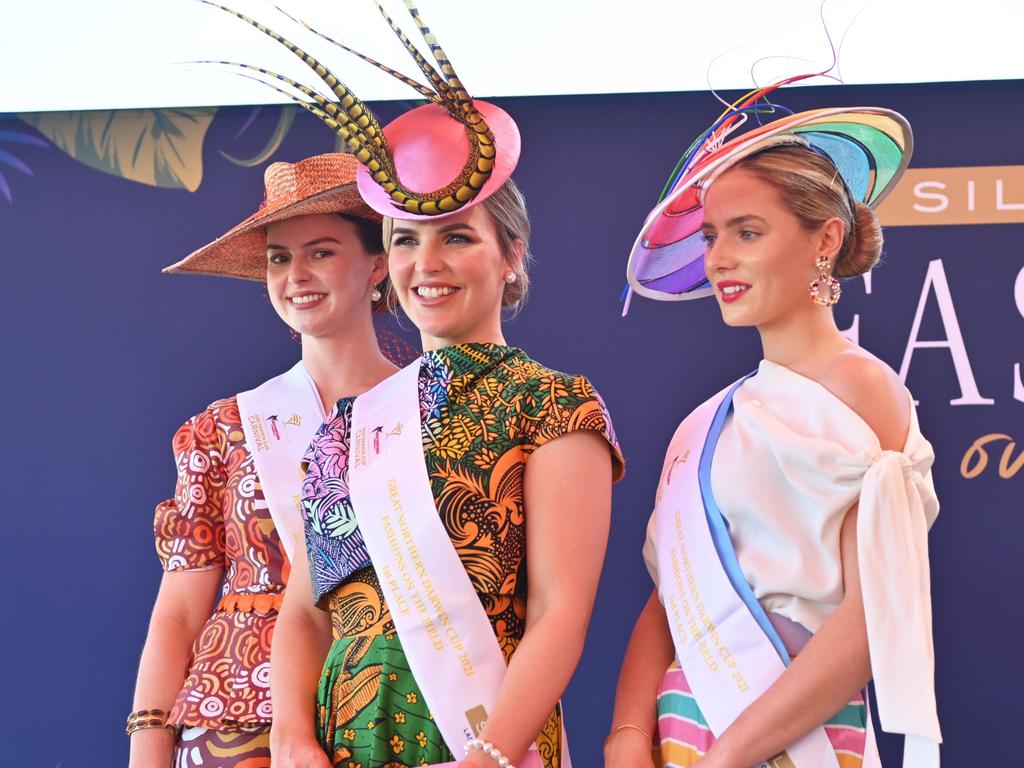 Mietta Russell, Hannah Burns and Jaimee Bruggemann win the 2021 Darwin Cup Fashions on the Field competition. Picture: Julianne Osborne