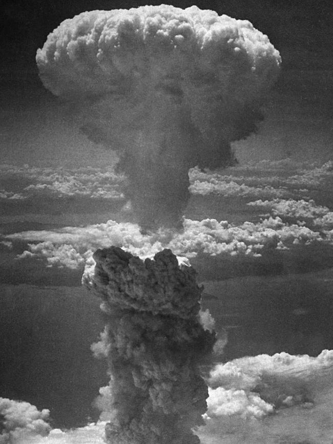 A giant column of dark smoke rises more than 20,000 feet into the air, after the second atomic bomb over the Japanese port and town of Nagasaki on August 9, 1945. Picture: AP Photo/USAF