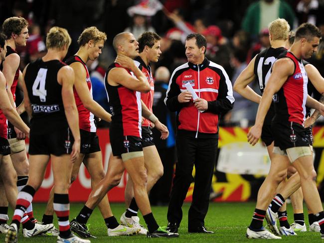 Ross Lyon and the Saints after their elimination final loss in 2011.