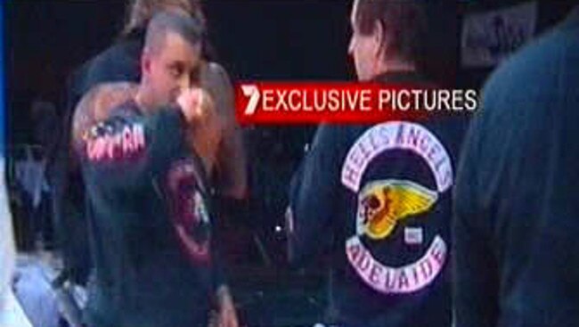 Bikie gang member being stabbed during brawl fight between Hell's Angels and Finks motorcycle club members during the VAS Xplosion kickboxing tournament at Royal Pines on the Gold Coast on March 18, 2006. Picture: Channel Seven