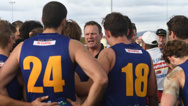 PHOS Camden coach Simon Quinn addresses his charges. Picture: Tricia Watkinson