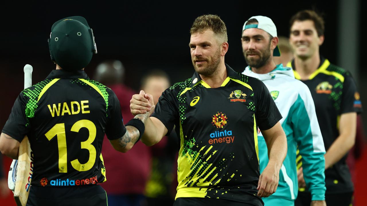 Aaron Finch and Matthew Wade papered over Australia’s batting cracks. Picture: Chris Hyde/Getty Images