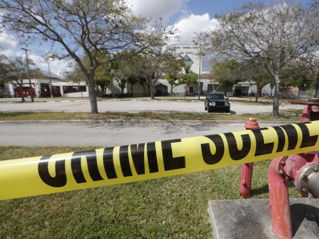Crime scene tape around Marjory Stoneman Douglas High School in Florida. Picture: AP/Gerald Herbert