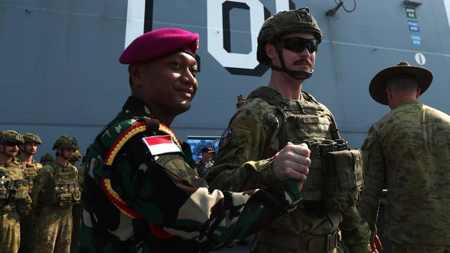 Indonesian National Armed Forces Head of Delegation Lieutenant Colonel Empri Airudin during a ceremonial patch sharing ceremony aboard the HMAS Adelaide in Darwin ahead of Exercise Keris Woomera on November 3. Picture: Zizi Averill