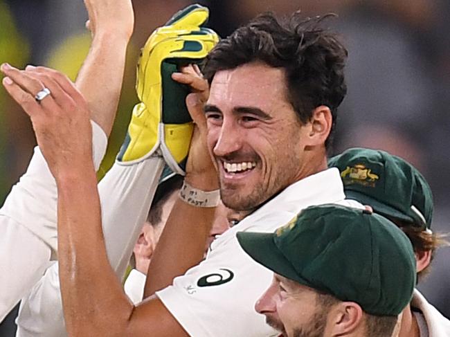 Australian bowler Mitchell Starc reacts after taking a wicket on day 2 of the first Test match between Australia and New Zealand at Optus Stadium in Perth, Friday, December 13, 2019. (AAP Image/Dave Hunt) NO ARCHIVING, EDITORIAL USE ONLY, IMAGES TO BE USED FOR NEWS REPORTING PURPOSES ONLY, NO COMMERCIAL USE WHATSOEVER, NO USE IN BOOKS WITHOUT PRIOR WRITTEN CONSENT FROM AAP