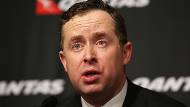 Alan Joyce, chief executive officer of Qantas Airways Ltd., speaks during a news conference in Sydney, Australia, on Thursday, Aug. 28, 2014. Qantas, Australia's biggest carrier, forecast a return to profit after posting a record loss as a domestic market share fight with Virgin Australia Holdings Ltd. eases. Photographer: Brendon Thorne/Bloomberg via Getty Images