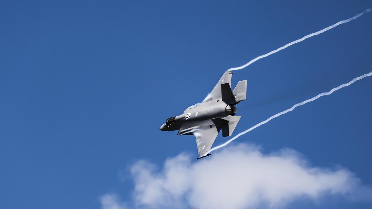 A RAAF F-35A Lightning II jet puts on a display above Sydney Harbour during the Australia Day Ferrython on Sydney Harbour. Picture: Dylan Robinson / NCA NewsWire