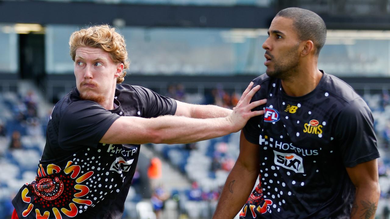 Matt Rowell (left) and Touk Miller are eager to prove the Suns’ midfield worth against Harley Reid and the Eagles on Sunday. (Photo by Dylan Burns/AFL Photos via Getty Images)