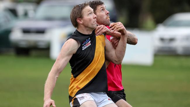 RDFL: Lancefield’s Tom Waters and Romsey’s Nathan Hoy tussle. Picture: George Sal