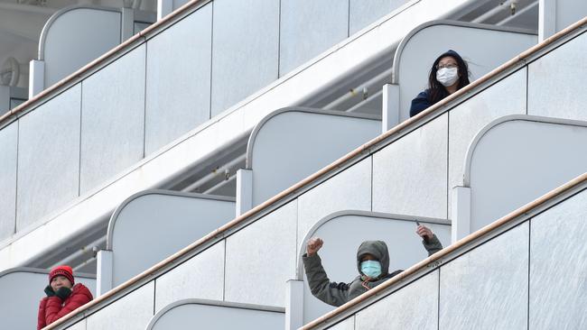 A total of 61 passengers on board a cruise liner docked off Japan have tested positive for coronavirus. Picture: AFP