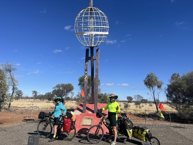 Phil and Ned at the Tropic of Capricorn. Phil Wise with son Ned 14 cycled from Hobart to Darwin. Picture: supplied