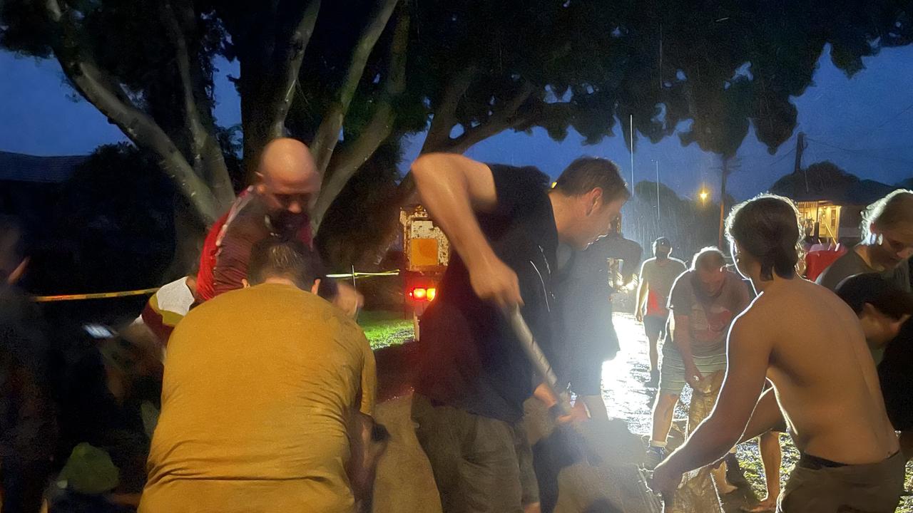 Filling sandbags on Monday night at Grafton. Lexi Lamberth