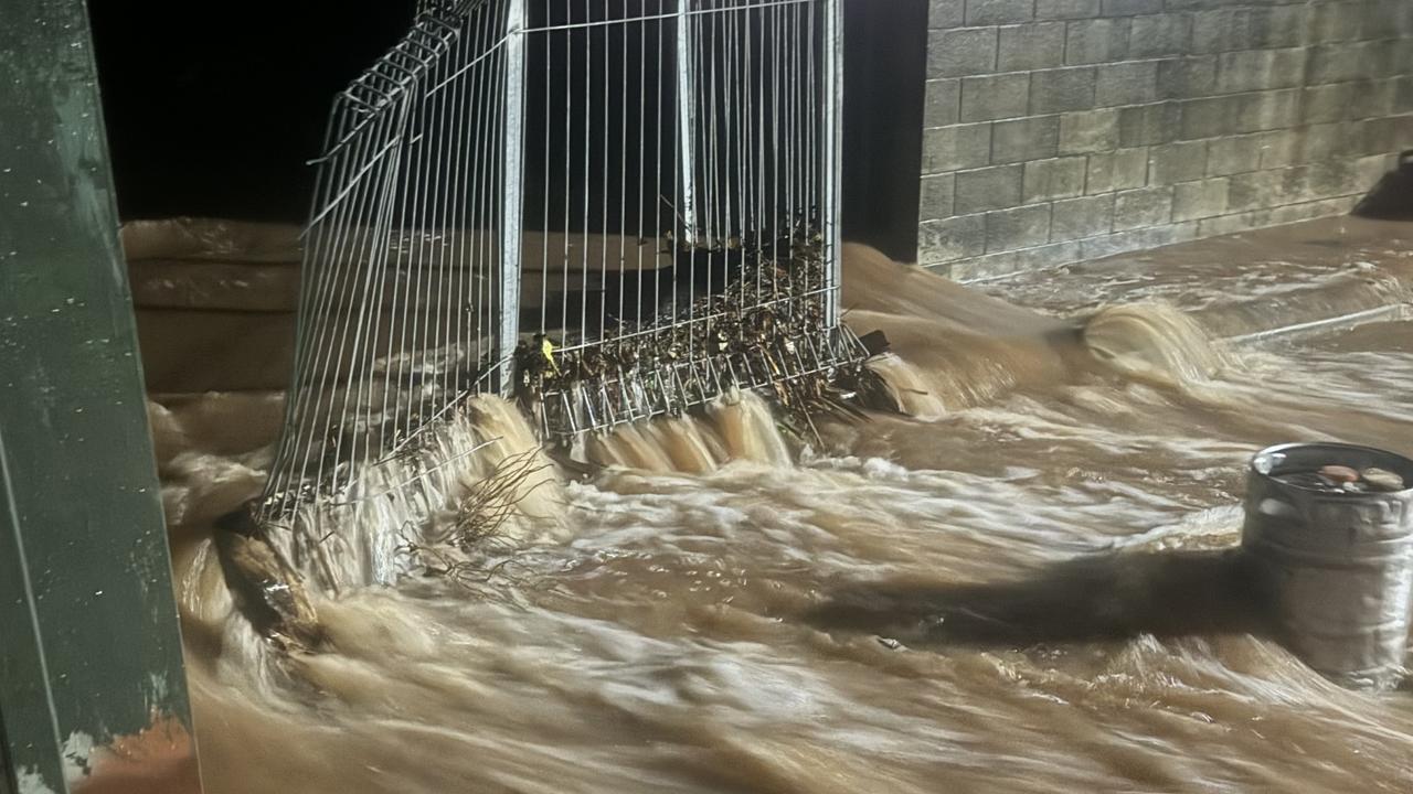 A recently installed drain grate caused a torrent of water to sweep through Edge Hill Village on Saturday, 17 February 2024. Picture: Supplied