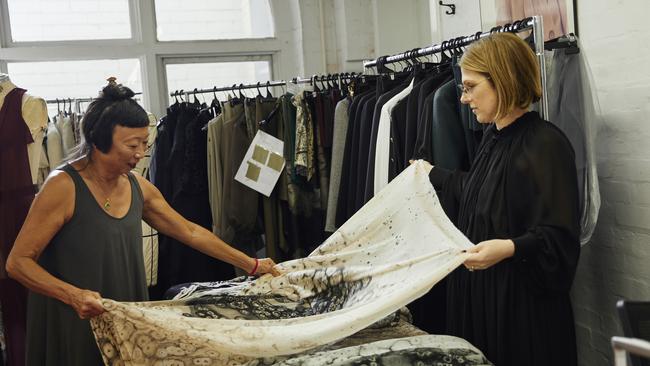 Artist Lindy Lee and Carla Zampatti creative director Karlie Ungar previewing the fabrics. Picture: Darren McDonald