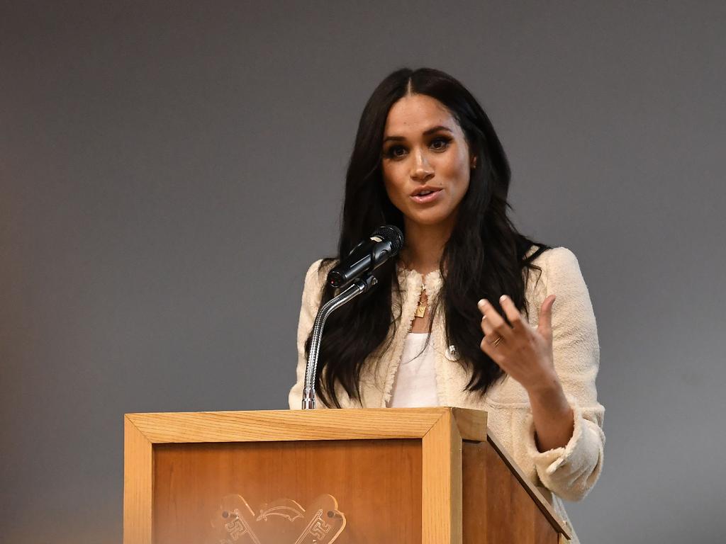 Harry and Meghan have signed up with an elite New York speaking agency. Above, Meghan speaks during a school assembly as part of a visit to Robert Clack School in Essex in support of International Women’s Day. Picture: Ben Stansall/AFP