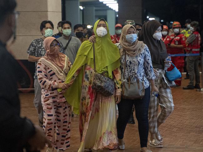 Relatives of Sriwijaya Air flight SJ 182 arrive at the crisis centre in Soekarno Hatta Airport, on January 09, 2021 in Jakarta. Picture: Oscar Siagian/Getty Images