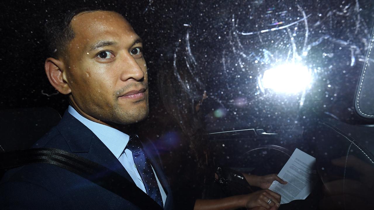 Wallabies star Israel Folau leaves a Code of Conduct hearing in Sydney.