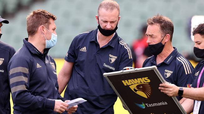 Alastair Clarkson with assistant coach Sam Mitchell at quarter time. Picture: Michael Klein