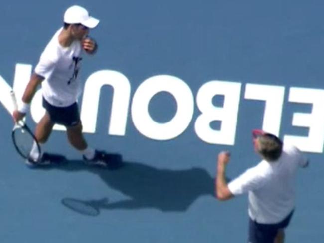 Image from Clint Stanaway twitter account.Novak Djokovic practicing on Rod Laver arena with coach Goran Ivaniševićhttps://twitter.com/cstanaway/status/1480765304170954757/photo/1